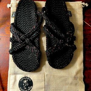 Nomadic shoes new never worn